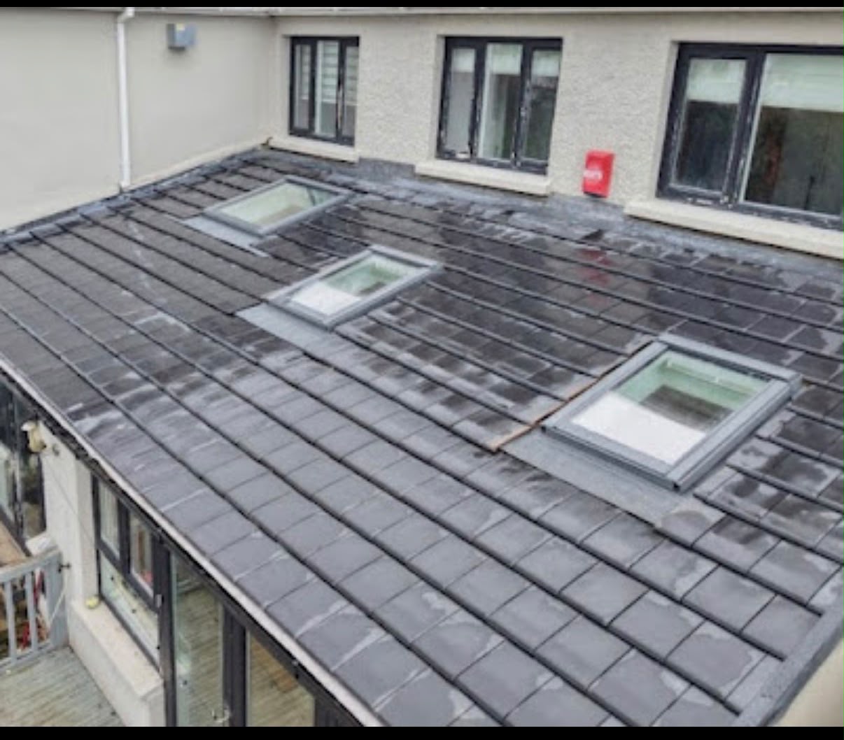 Slate roof with Velux skylight installation in Colchester, Burton Roofing Ltd